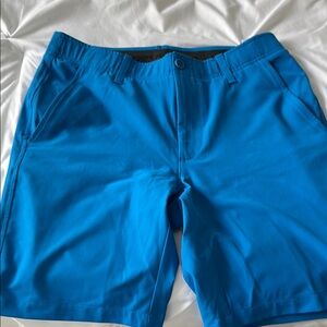 Under Armour golf performance shorts size 32. Bright blue.